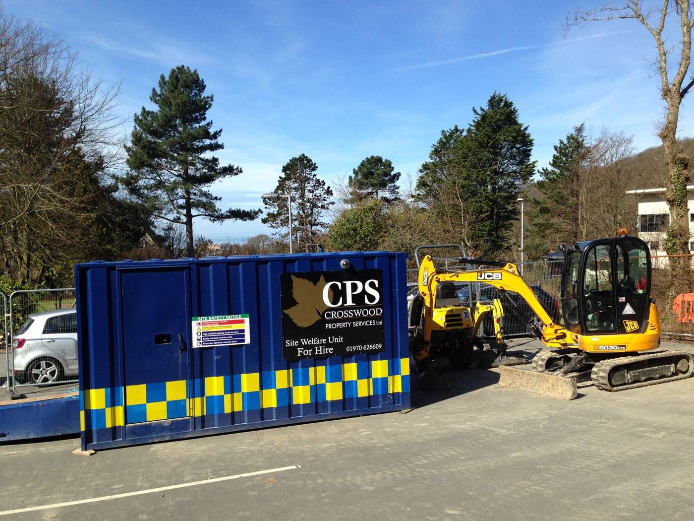 CPS Ltd welfare unit and mini digger on a site